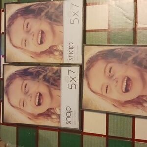 3 5x7 plastic frames